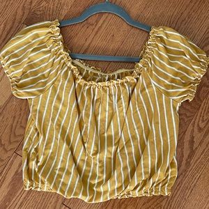 Ruched mustard yellow shirt and burnt orange shirt, same style